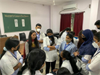 Ms Rajgandhi in talk with students during the workshop